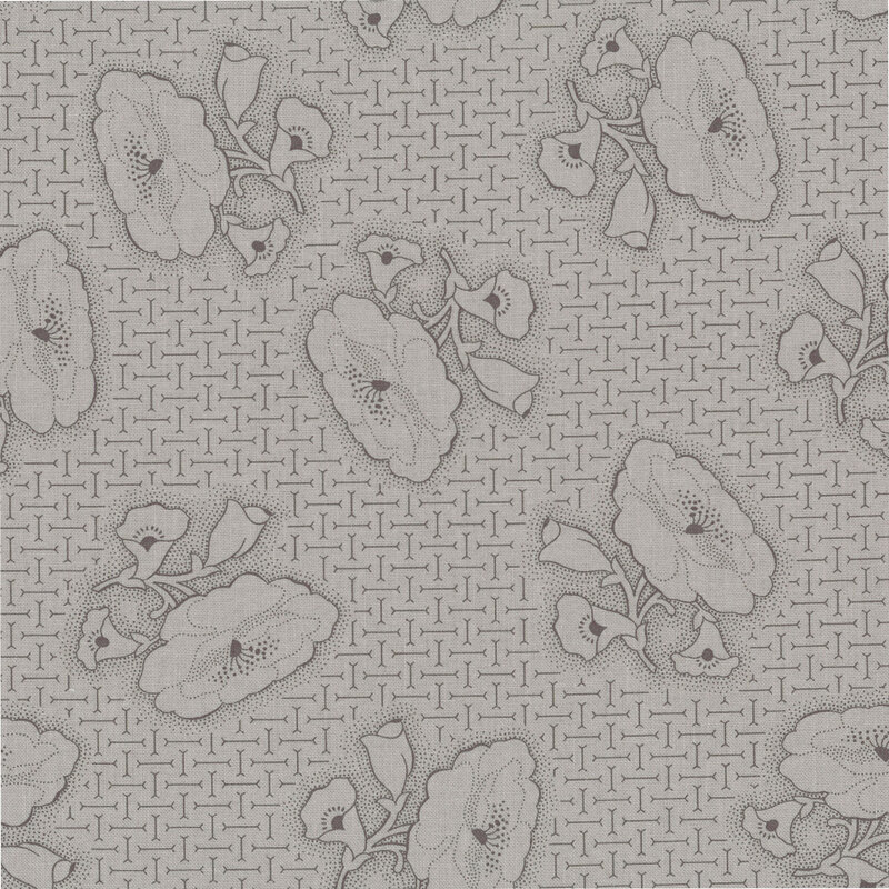 Gray fabric with a balanced pattern of bone motifs topped with soft black stippled florals.