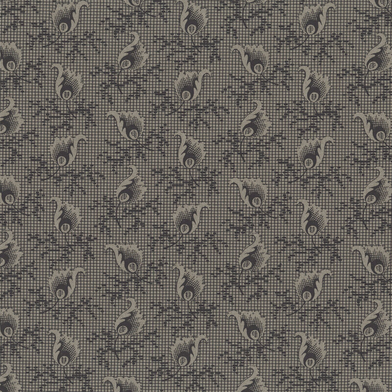 Dark gray fabric with a small grid topped with scattered leaf motifs.