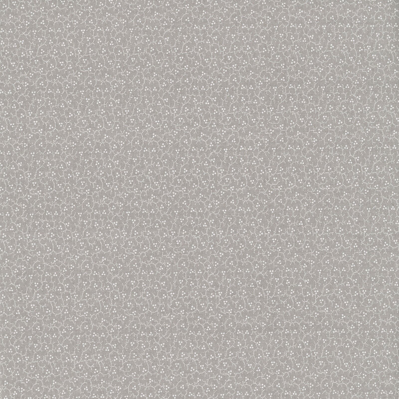 Gray fabric with a packed small design of white stippled vines and berries.