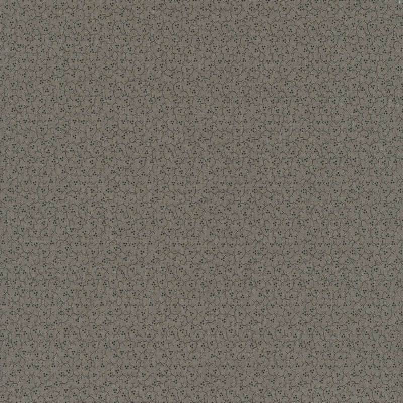 Dark gray-colored fabric with a packed small design of black stippled vines and berries.