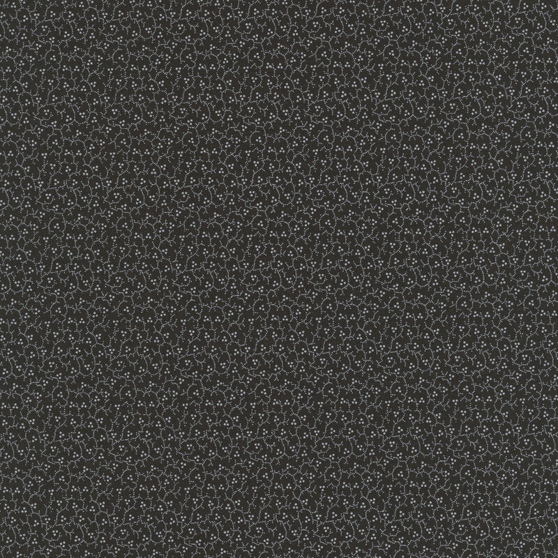 Charcoal-colored fabric with a packed small design of white stippled vines and berries.