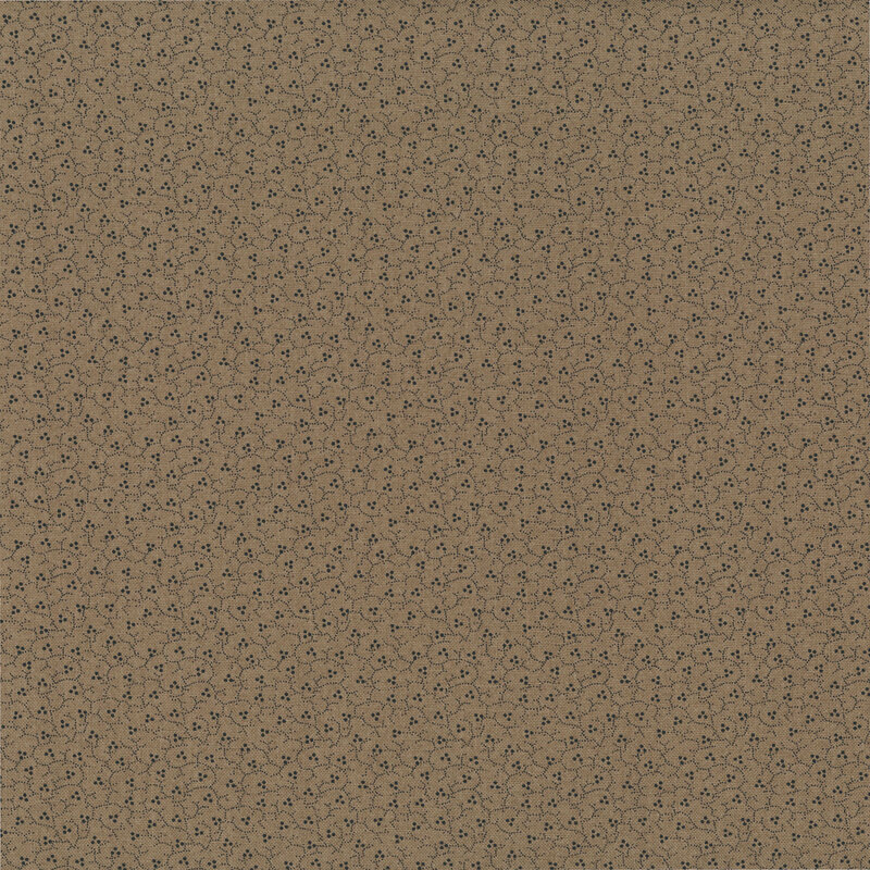 Chocolate brown fabric with a packed small design of black stippled vines and berries.