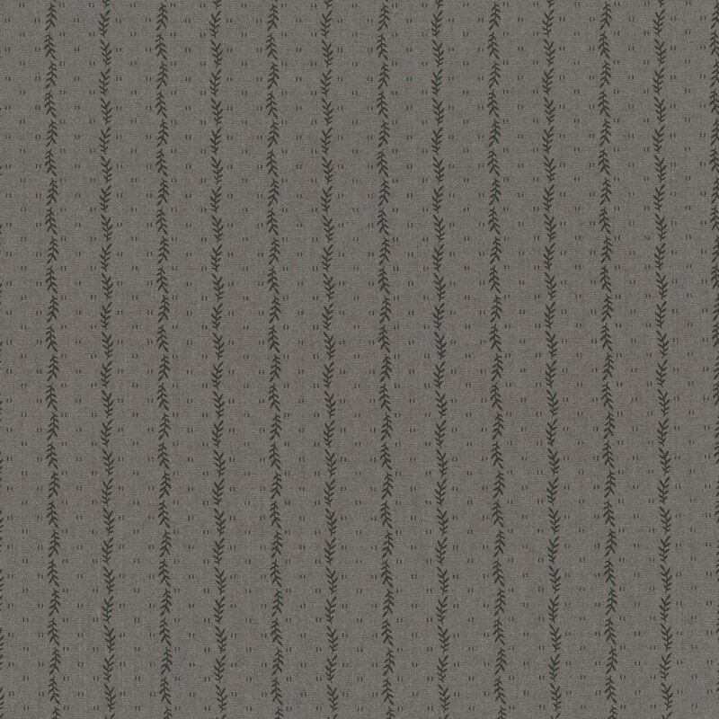 Ash gray fabric with a striped pattern of small black leaves decorated with small, scattered primitive markings.