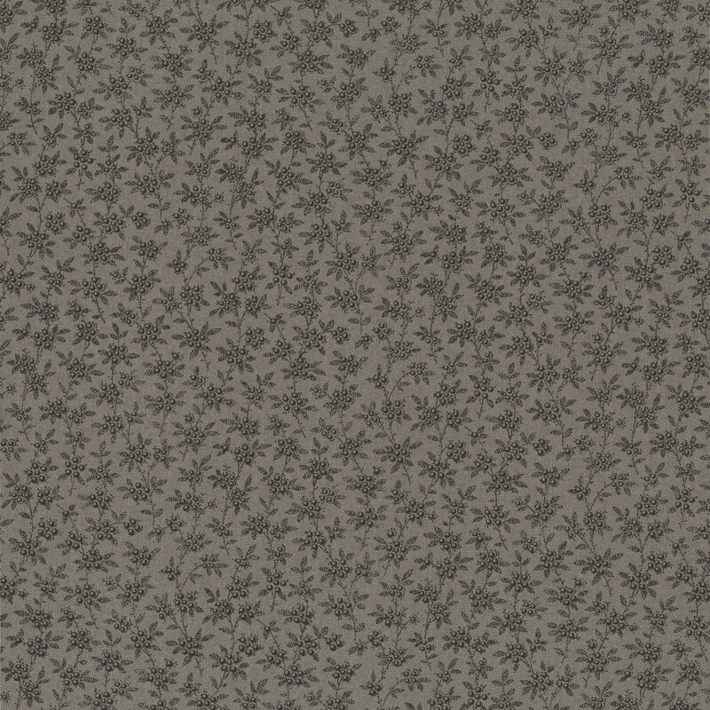 Ash-colored fabric with a packed, tonal design of small leafy vines adorned with berries.