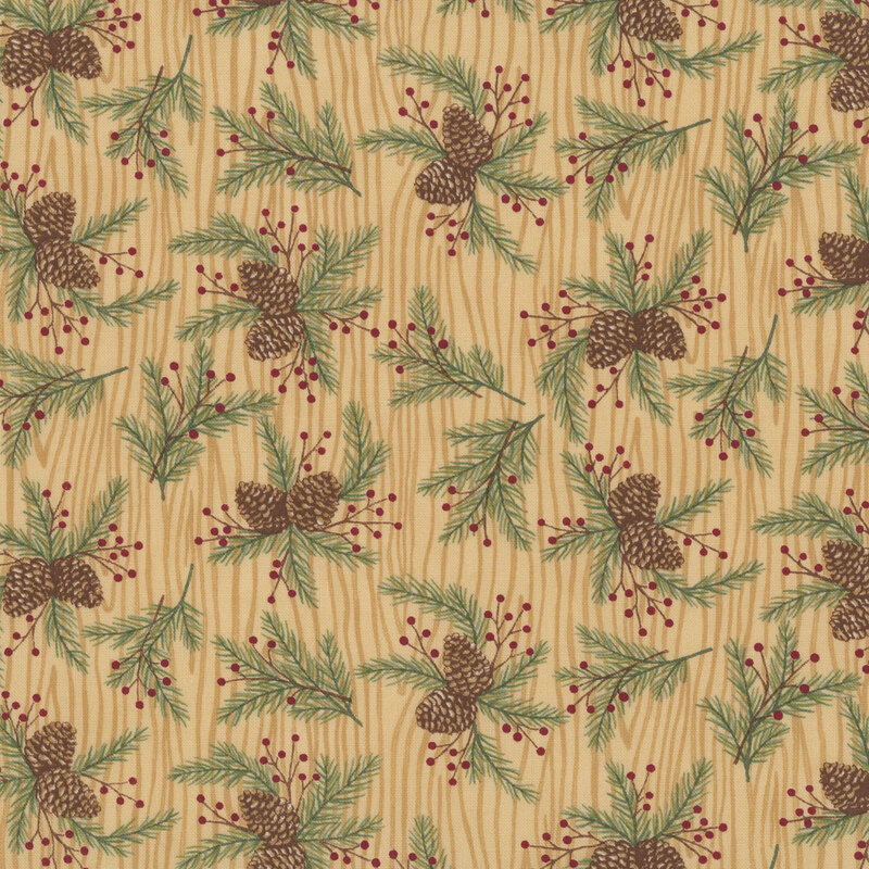 Tan fabric with a natural wood grain pattern topped with tossed pine boughs.