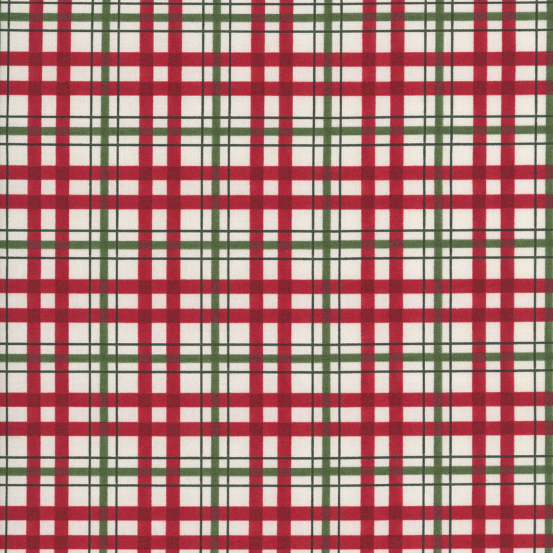 Cream fabric with a large red plaid layered with a smaller green plaid.