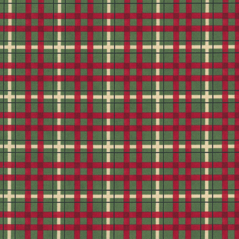 Dark green fabric with a large red plaid layered with a smaller pine green and cream plaid.