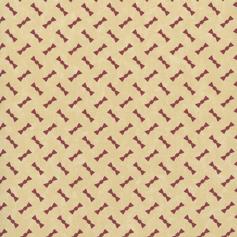 red bow motifs tossed on a mottled sand background.