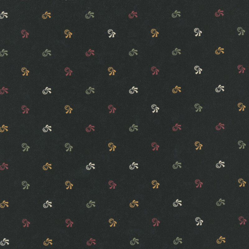 Black fabric with red, green, ocher, and white swirling motifs.