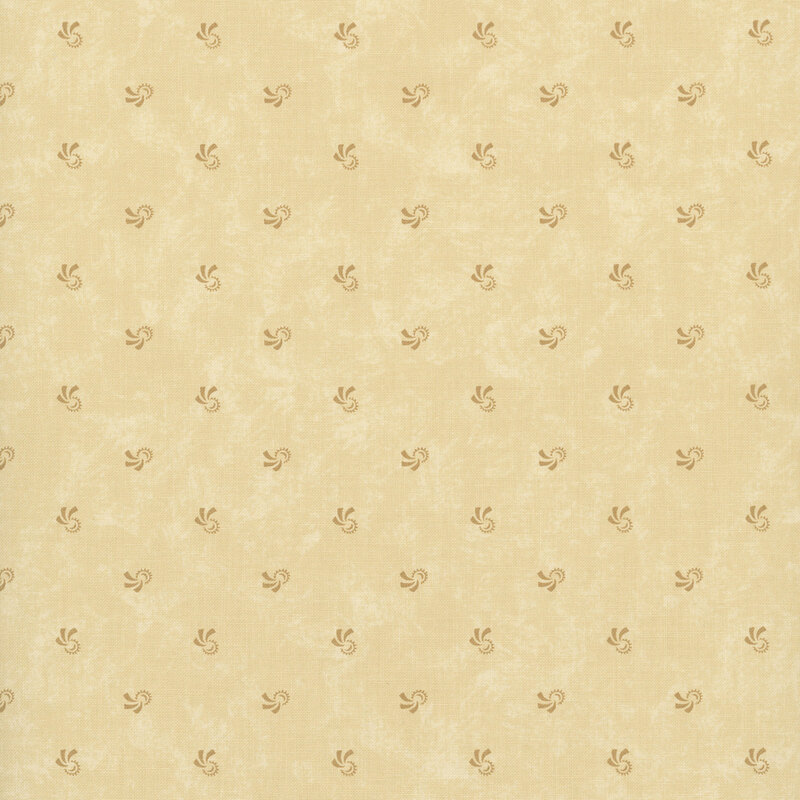 Mottled sand fabric with tonal swirling motifs.