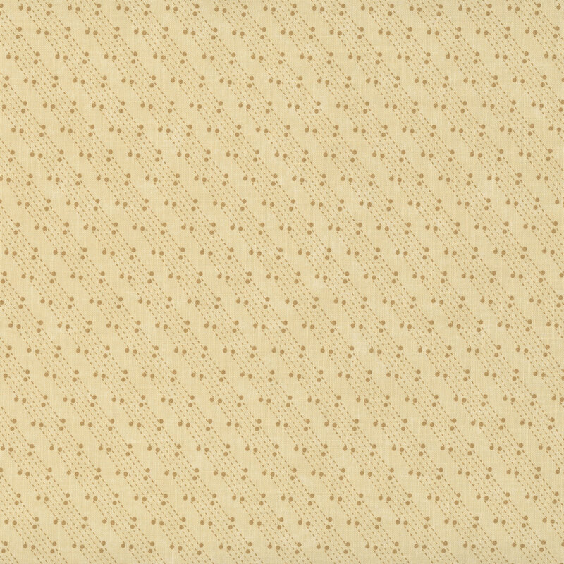 Mottled sand tan fabric featuring a stylized beaded-chain pattern in tonal shades