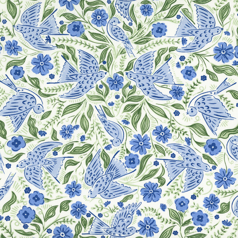 A white fabric with blue birds and florals.