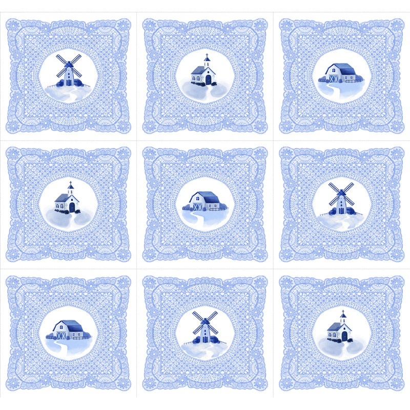 A white fabric with blue windmills, churches, and farmhouses inside intricate lace-inspired square frames arranged in a repeating grid.