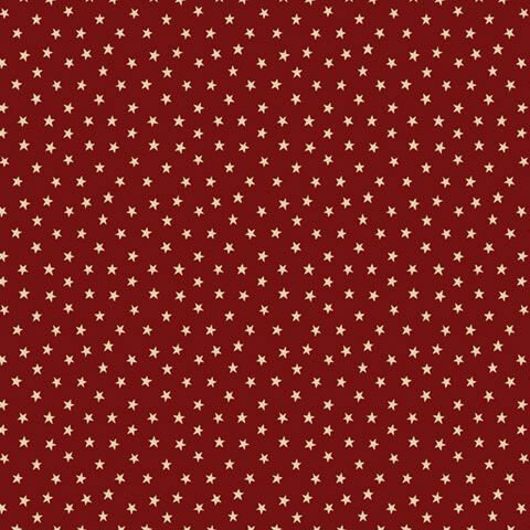 Wine red fabric with a scattered design of small light tan stars.