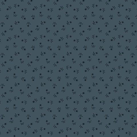 Indigo blue fabric with a tossed pattern of tonal stars and leaves.