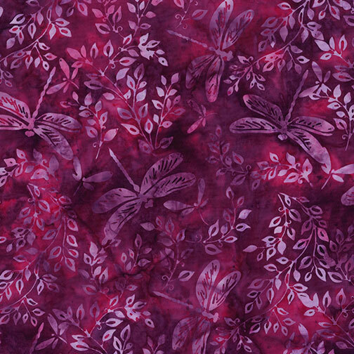 Garnet red batik with a tossed design of soft violet and mauve leaves and dragonflies.