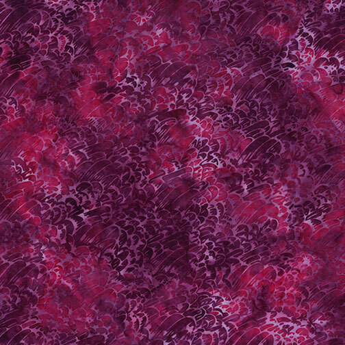 Multi-toned garnet and berry red batik with an abstract design of directional streaks and dots.