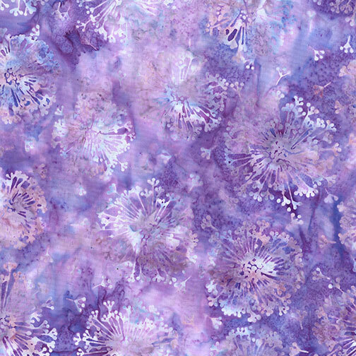 Light blue and wisteria purple batik with a scattered design of light blue and brown wispy dandelions.