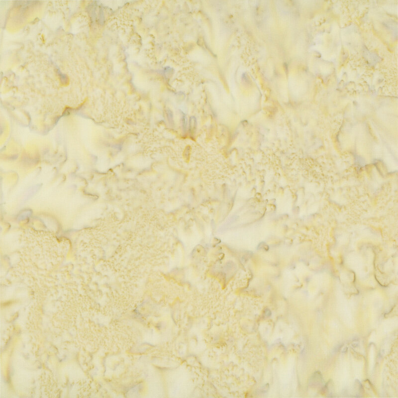 Marbled and mottled sandy tan batik fabric.