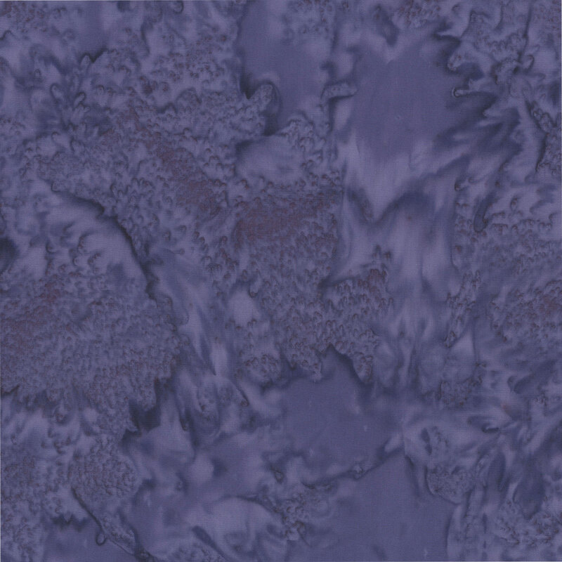 Marbled and mottled dark wisteria purple batik fabric.