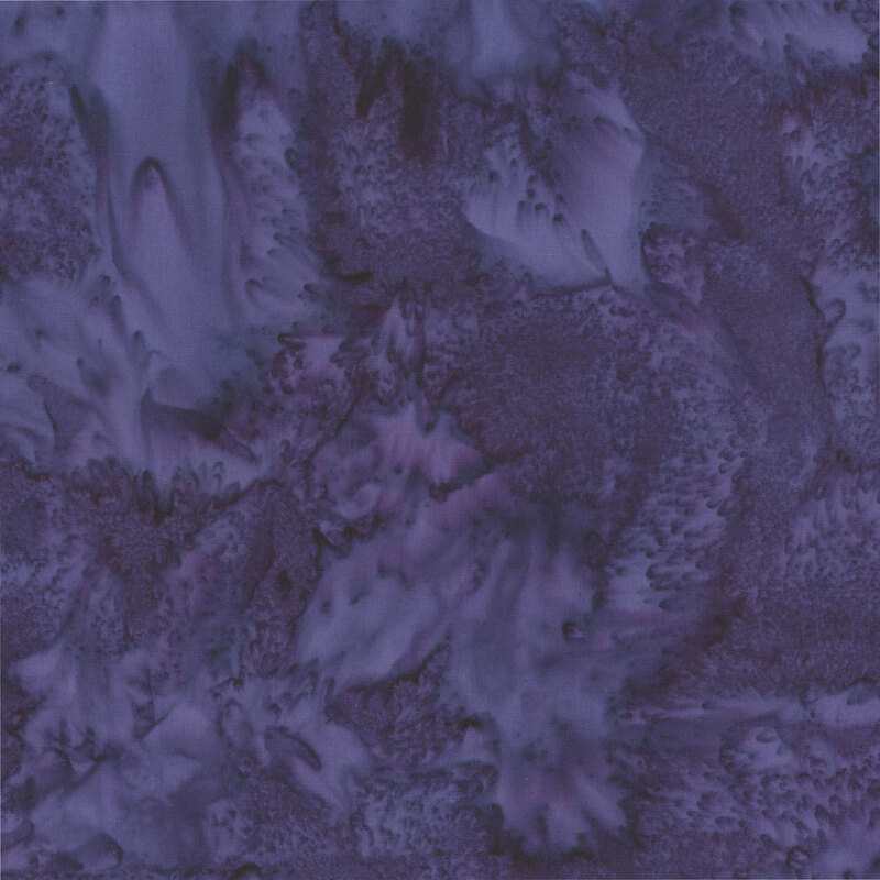 Marbled and mottled royal purple batik fabric.