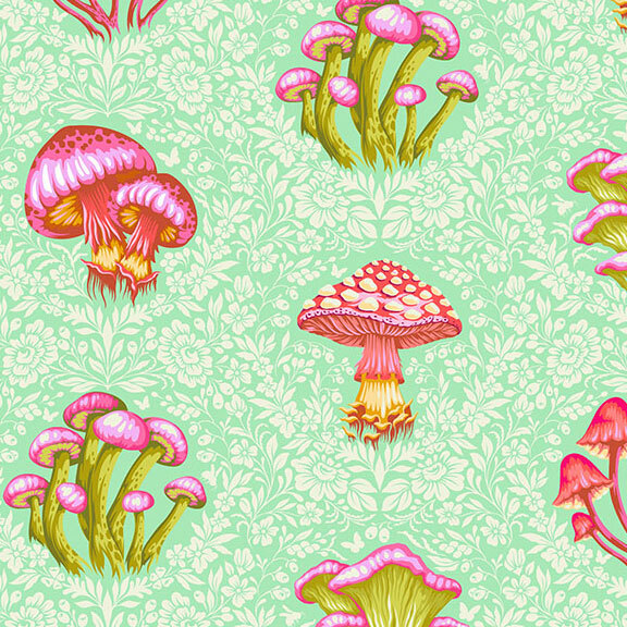 A mint green fabric with an array of mushrooms among floral motifs. 