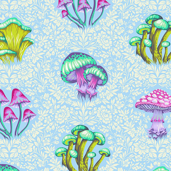 A light blue fabric with an array of vibrant mushrooms among scattered white florals. 