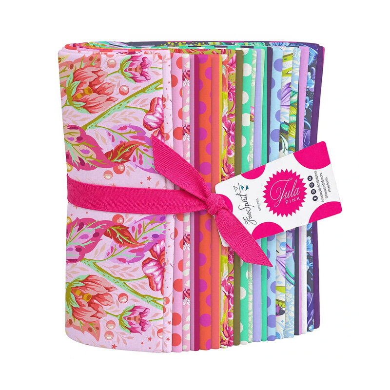 A bundle of fabrics featured in the Down to Earth 10" Design Strip by Tula Pink for FreeSpirit Fabrics, isolated on a white background.