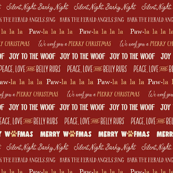 playful Christmas fabric features rows of dog-themed holiday sayings on a dark red background