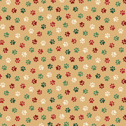 tiny scattered paw prints in festive shades of red, green, and cream against a warm tan background.