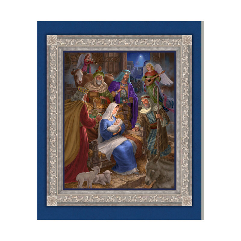 A deep blue fabric panel with a framed nativity scene showing Mary holding baby Jesus, three wise men, a shepherd, angels, and animals within a silver scrollwork border.