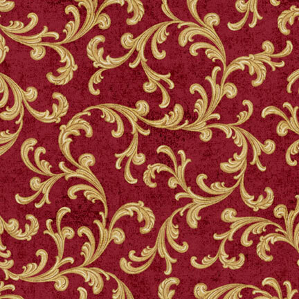 A textured crimson red fabric with large gold ornamental scrolls and curling acanthus leaves.
