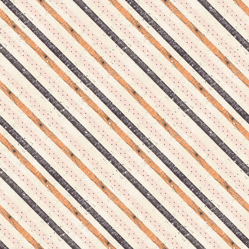 cream Halloween fabric featuring diagonal stripes in shades of orange, black, and blush pink, accented with delicate spiderwebs, tiny stars, aged music sheets, and scattered black dots