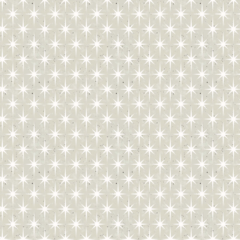 A cool sage fabric with evenly spaced white eight-pointed stars and scattered dark speckles.