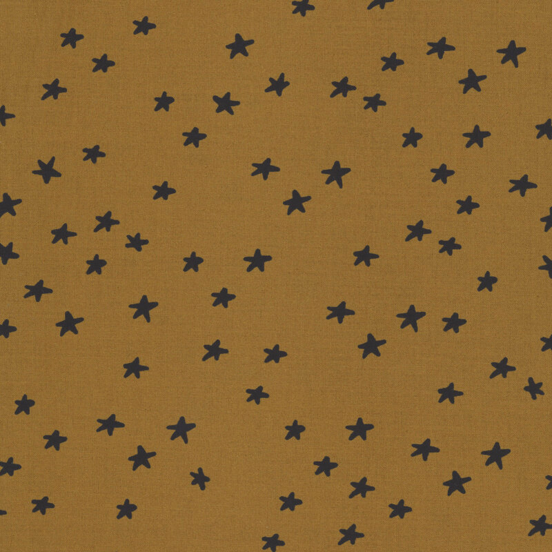 brown fabric featuring black stars.