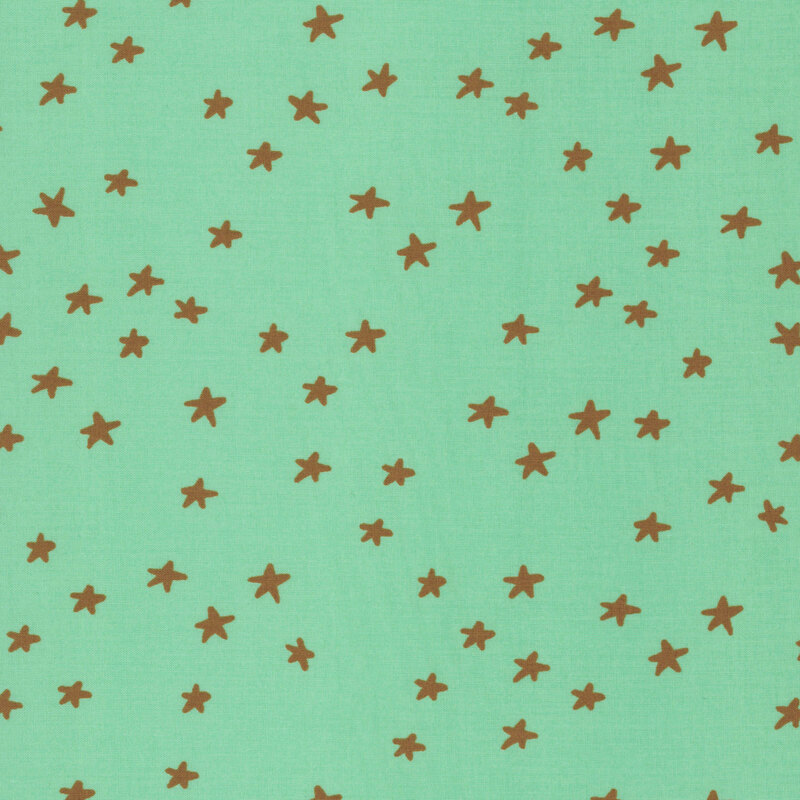 mint green fabric featuring brown stars.