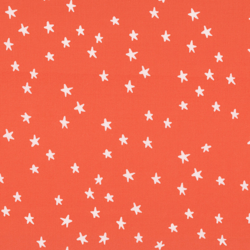 bright orange fabric featuring white stars.