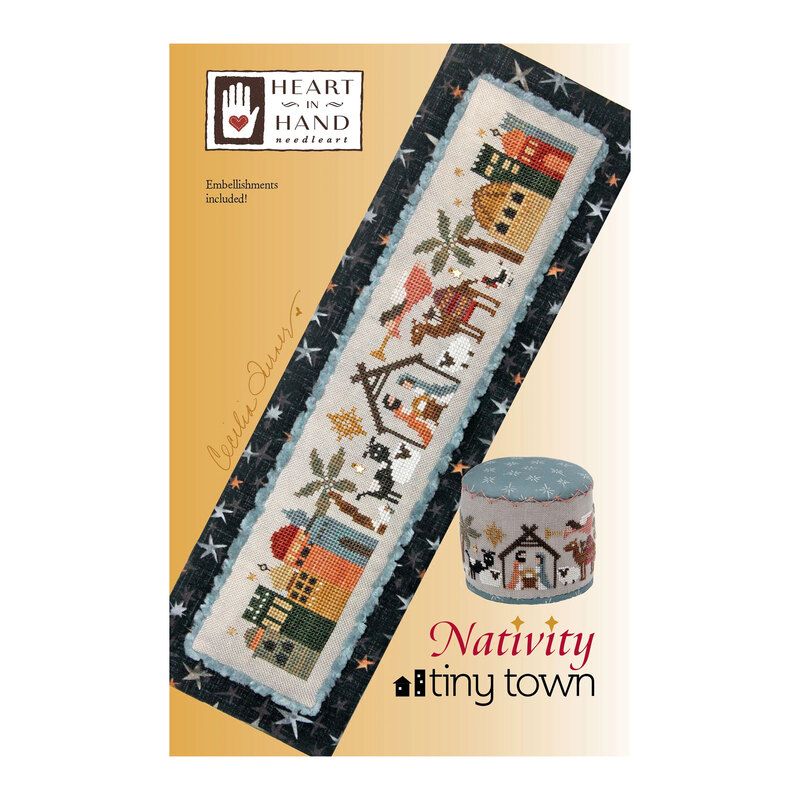 Front cover of the Nativity Tiny Town finished pattern isolated on a gold background.