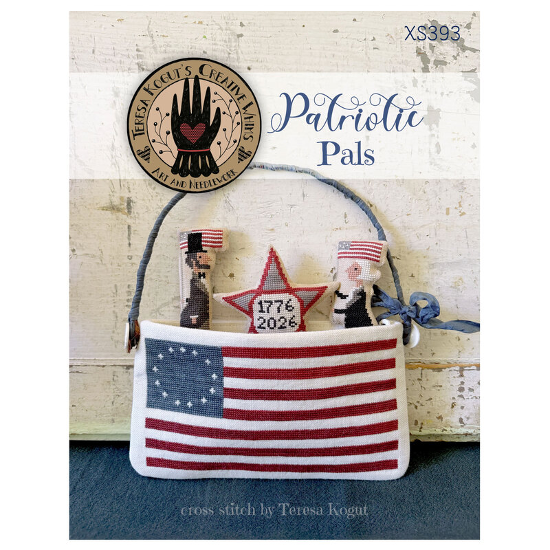 The front of the pattern with the completed patriotic cross stitch design. 