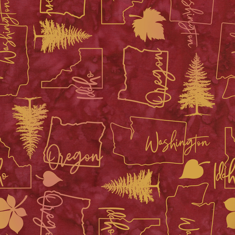 Mottled red batik fabric with a tossed pattern of leaves, trees, and silhouettes of the Pacific Northwest states.