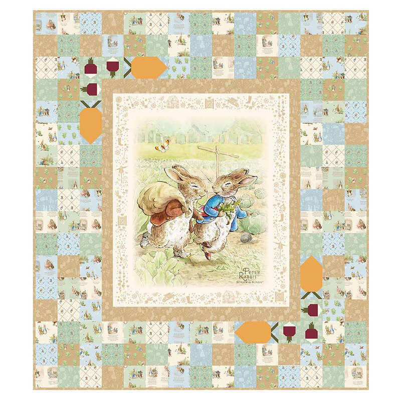 A panel quilt with bunny and floral designs on a patterned background.