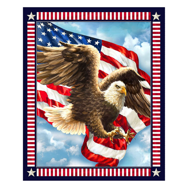 A patriotic fabric panel with a bald eagle spreading its wings in front of an American flag, surrounded by red and white stripes and stars on a navy border.
