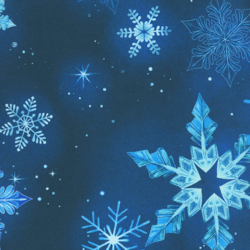 blue, aqua, and ice blue intricate snowflakes with scattered stars and speckled dots on a mottled navy background.