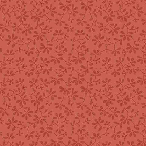 Rouge red fabric with a pattern of tonal, cinnabar red floral vines.