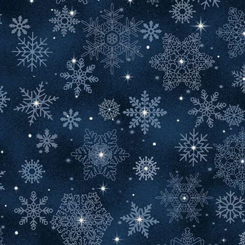 Mottled navy fabric with a scattered pattern of snowflakes and small stars.
