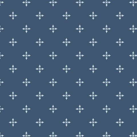 Indigo blue fabric with a balanced grid pattern of stylized, pointed snowflakes.