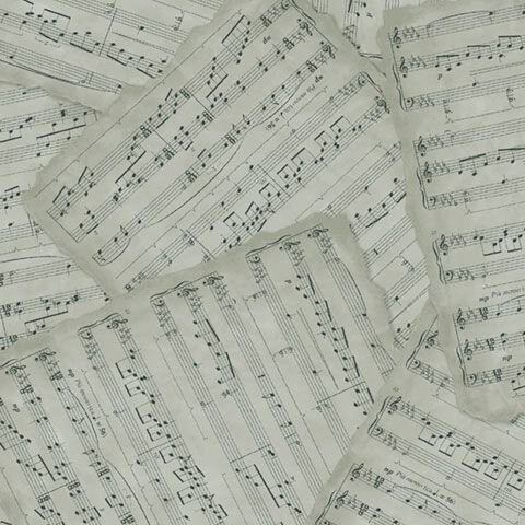 Slate gray backing fabric with a layered pattern of Christmas sheet music.