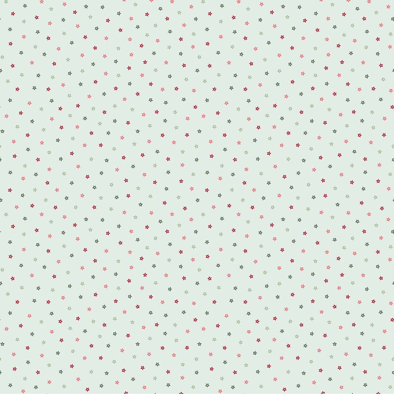 fabric featuring tiny scattered stars in shades of red, pink, sage, and evergreen against a pale aqua background.