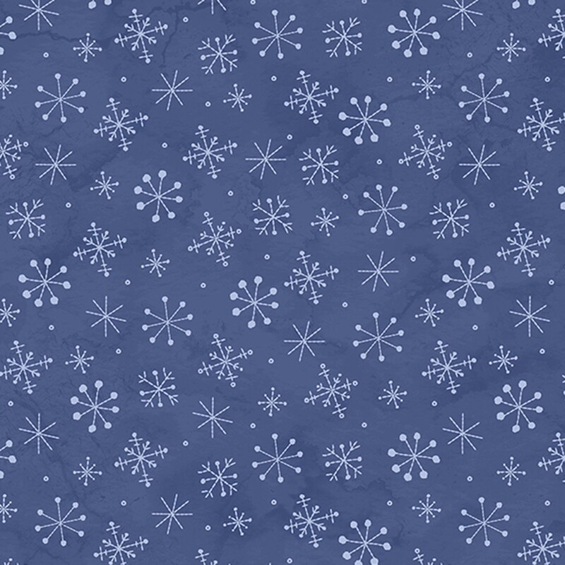 Mottled dark blue fabric with a scattered design of powder blue snowflakes.