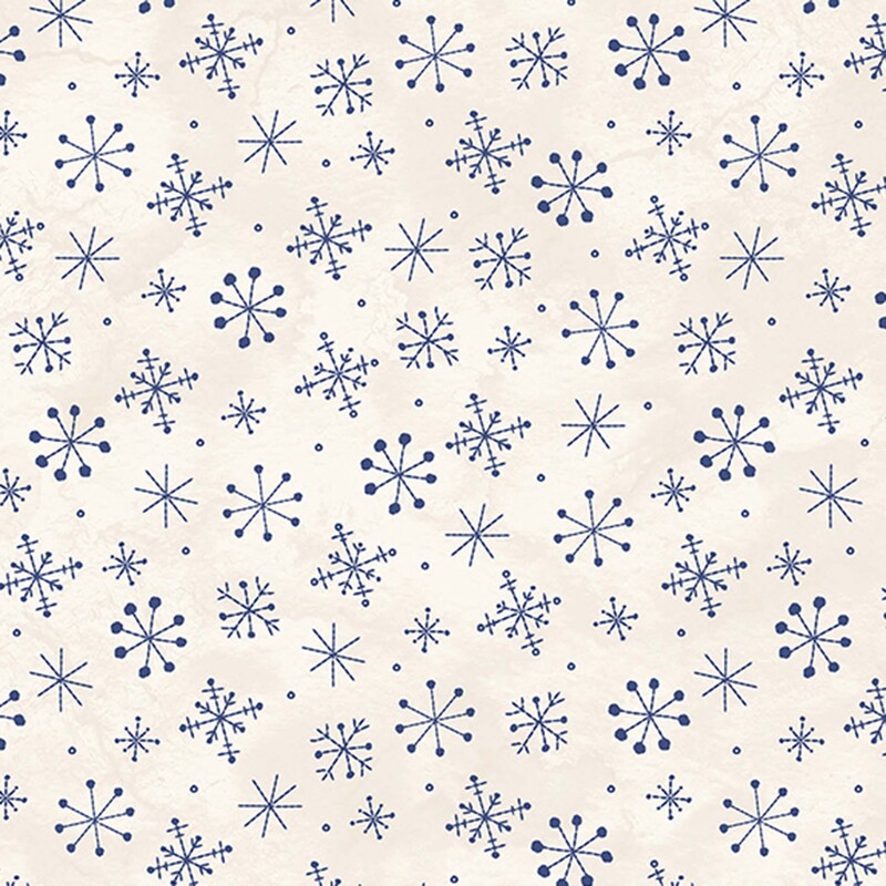 Mottled cream fabric with a scattered design of navy blue snowflakes.